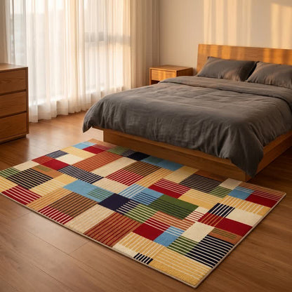 Gestreifter Patchwork-Teppich mit geometrischem Muster - image 1