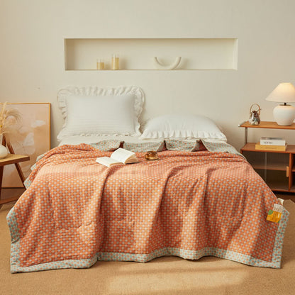 Wende-Steppdecke aus garngefärbtem Jacquard-Musselin - image 1