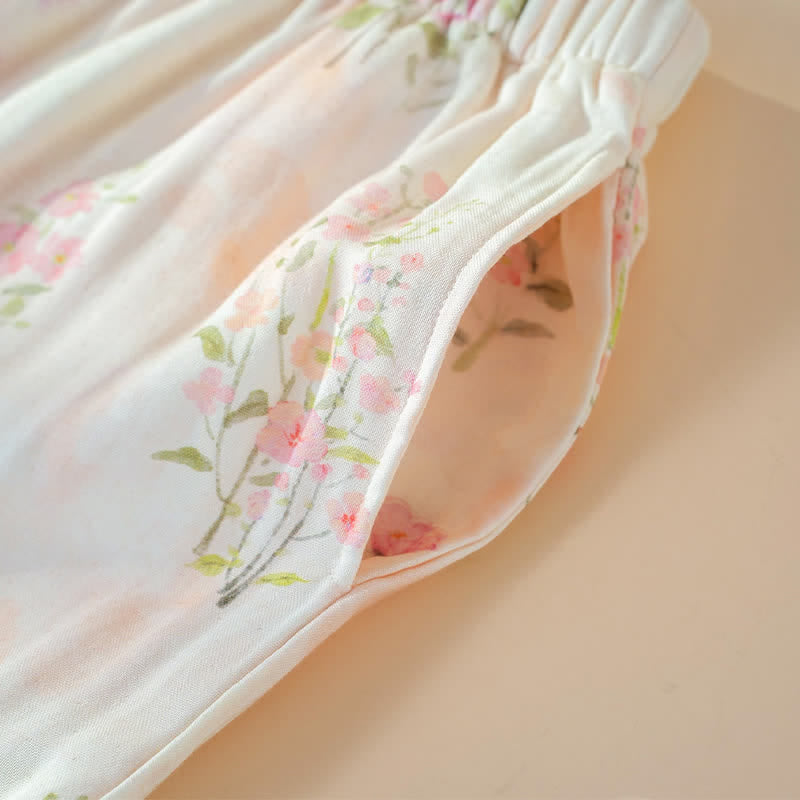 Pyjama mit Blumenmuster aus Bambus-Baumwolle mit Bindeband am Hals - image 10