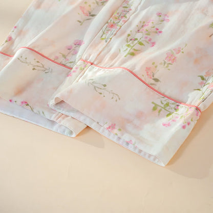 Pyjama mit Blumenmuster aus Bambus-Baumwolle mit Bindeband am Hals - image 11