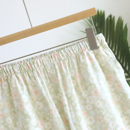 Grüne Pyjama-Shorts aus Baumwolle mit Blumenmuster und Rüschen - image 4