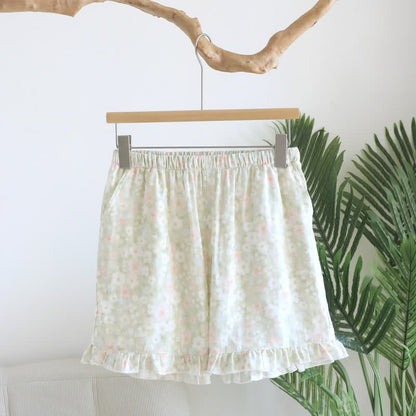 Grüne Pyjama-Shorts aus Baumwolle mit Blumenmuster und Rüschen - image 0