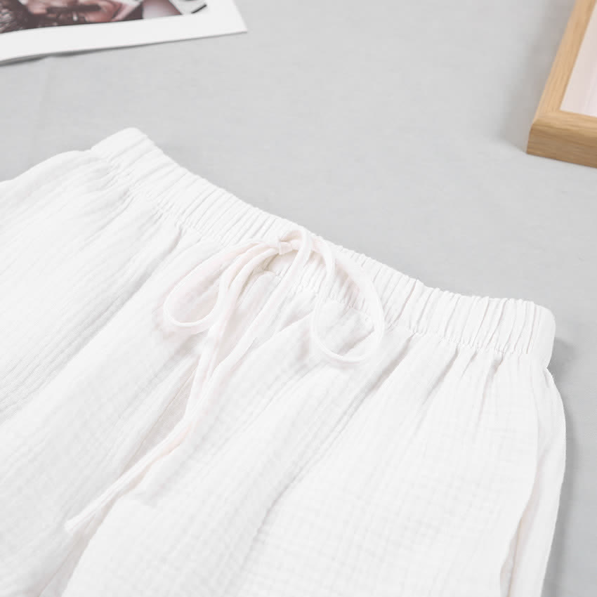 Pyjama-Set aus langärmeligem Oberteil und Shorts - image 11