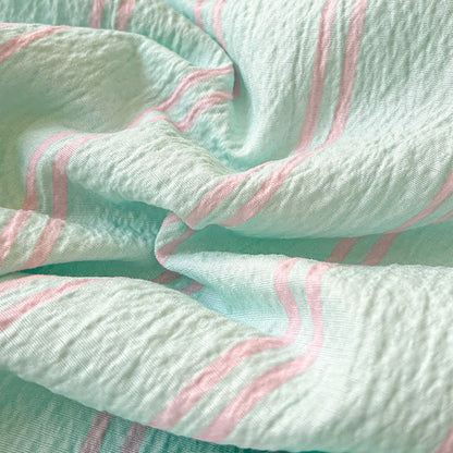 Steppdecke aus geknitterter Baumwolle mit mintfarbenen Streifen und abgesetztem Besatz - image 4