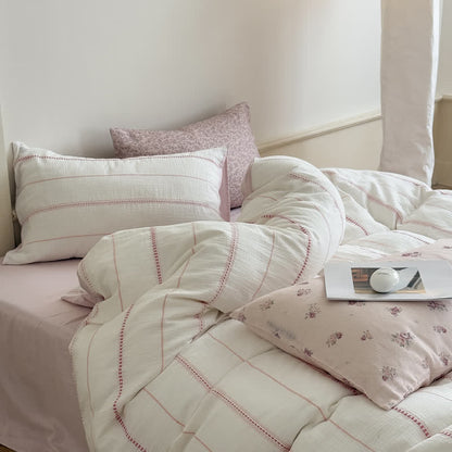 Vierteiliges Bettwäsche-Set aus gewaschener Baumwolle mit rosa Blütenmuster - image 3