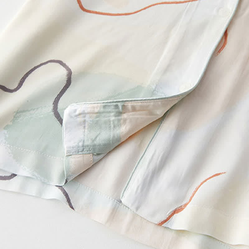 Loungewear-Set aus Satin mit abstraktem Print und kurzen Ärmeln - image 7
