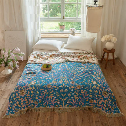 Wendbare Steppdecke aus Baumwollmusselin mit Blumenmuster und Quasten - image 3