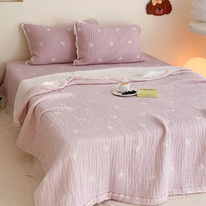 Sommerdecke aus gestepptem Lyocell mit Rüschen und Schleife - image 2