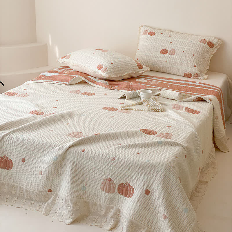 Sommerdecke aus gestepptem Lyocell in Creme-Kürbis-Optik - image 1