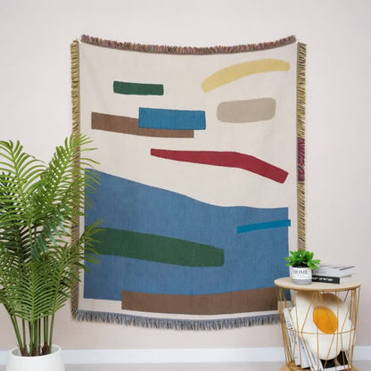 Künstlerisch gestaltete, geometrische, mit Fransen und Quasten verzierte Tagesdecke - image 1