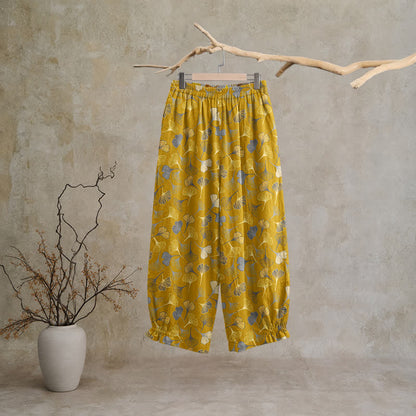 Mehrfarbige Loungehose aus Baumwolle mit Ginkgoblattmuster - image 6