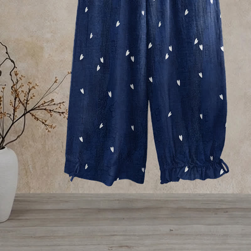 Verspielte marineblaue Loungehose mit Herzchenmuster - image 1
