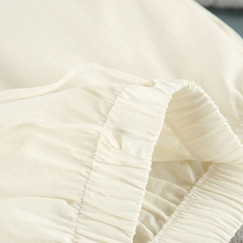 Minimalistischer Baumwoll-Pyjama-Set mit langen Ärmeln und Taschen - image 11