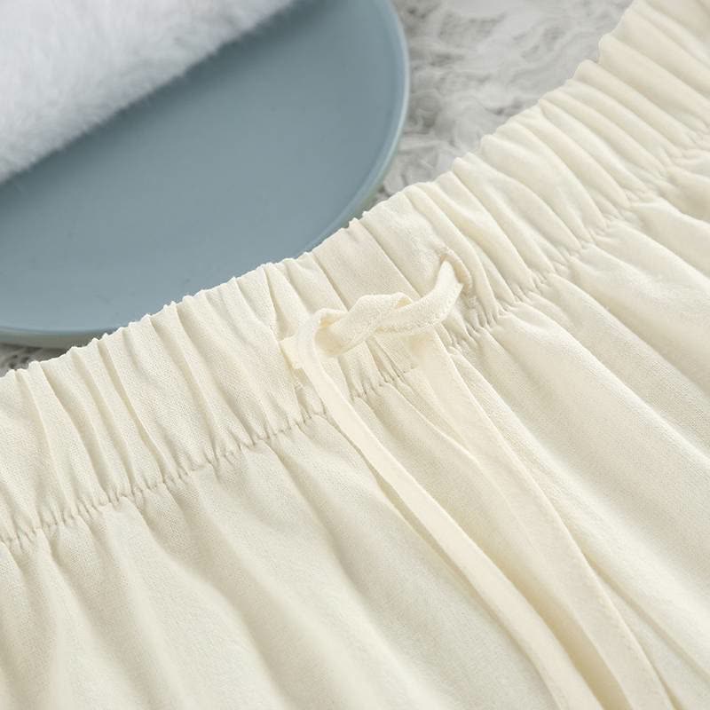 Minimalistischer Baumwoll-Pyjama-Set mit langen Ärmeln und Taschen - image 10