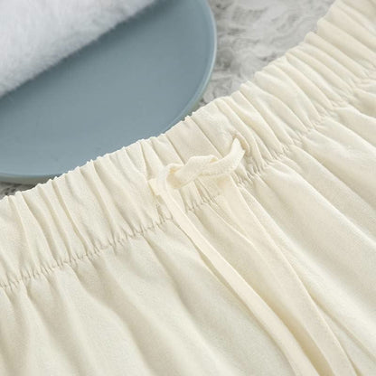 Minimalistischer Baumwoll-Pyjama-Set mit langen Ärmeln und Taschen - image 10