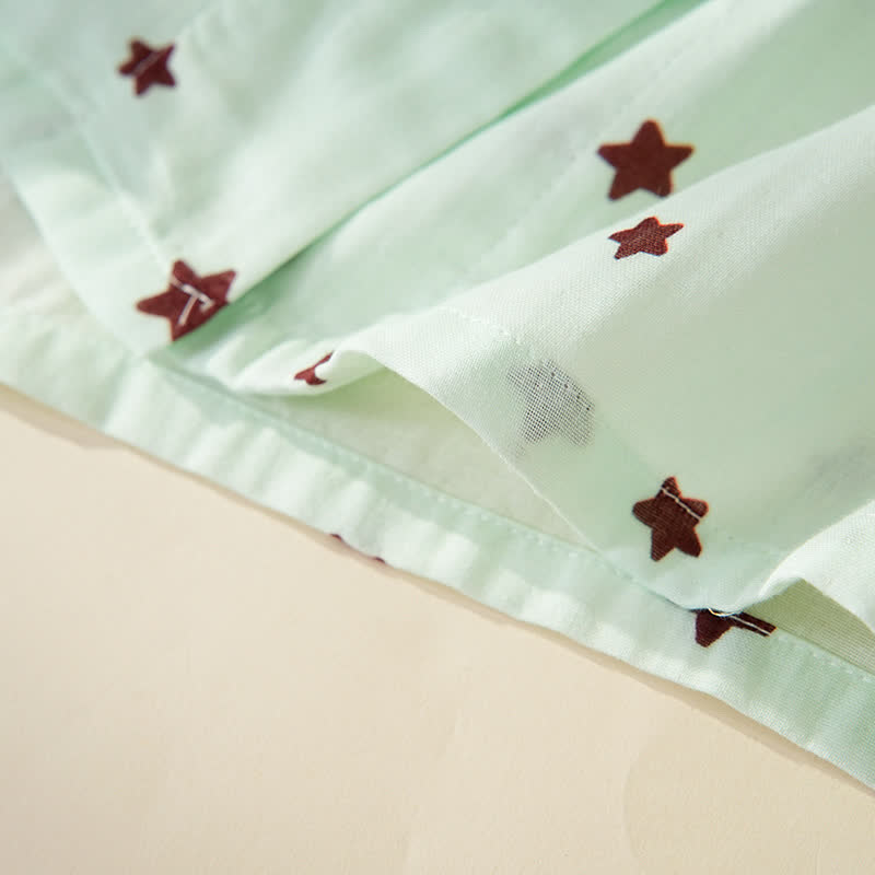 Baumwollpyjama mit pastellfarbenem Sternenmuster und langen Ärmeln - image 10