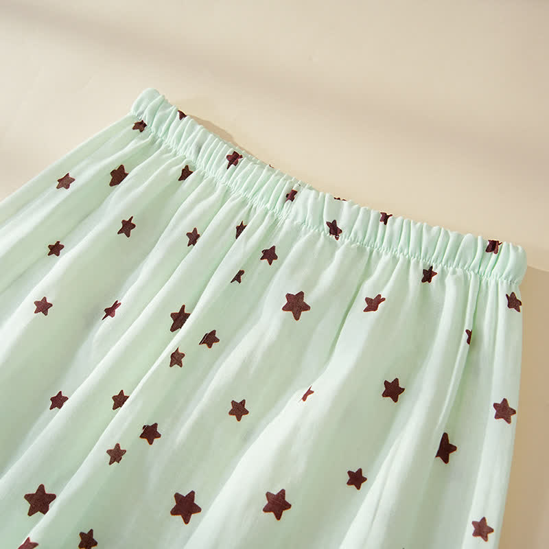Baumwollpyjama mit pastellfarbenem Sternenmuster und langen Ärmeln - image 9