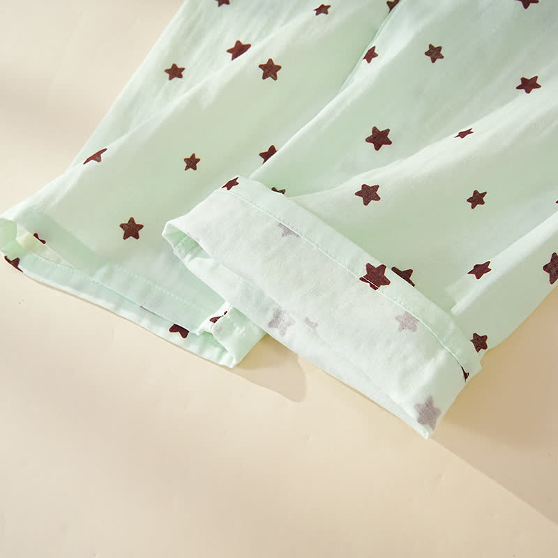 Baumwollpyjama mit pastellfarbenem Sternenmuster und langen Ärmeln - image 11