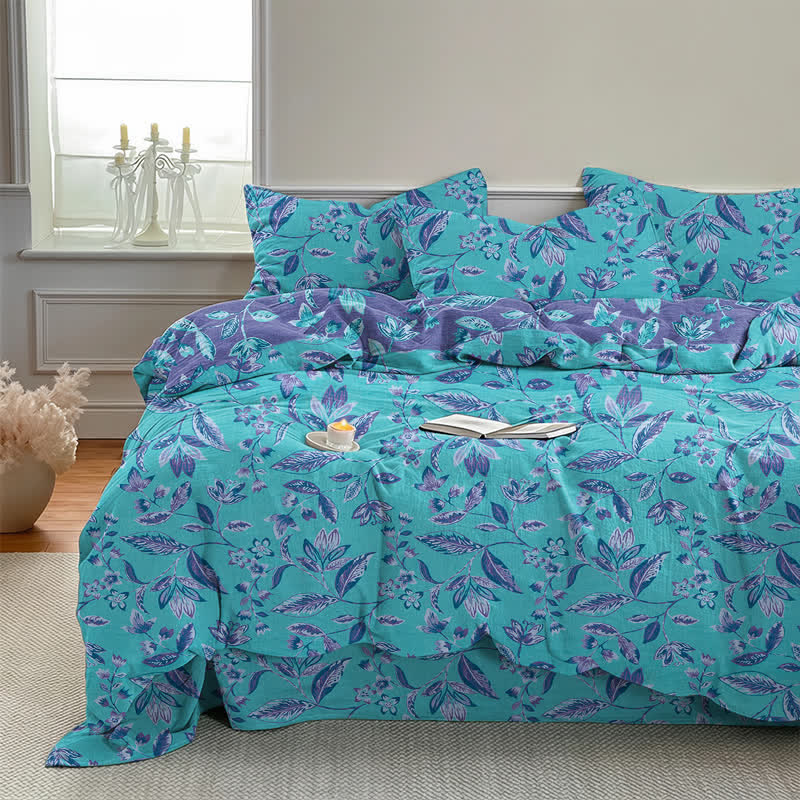 Bettwäsche-Set aus Baumwolle mit blauem und violettem Blattmuster - image 1