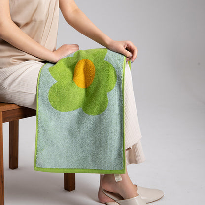 Atmungsaktives Baumwollhandtuch mit Blumenmuster und Farbblockdesign