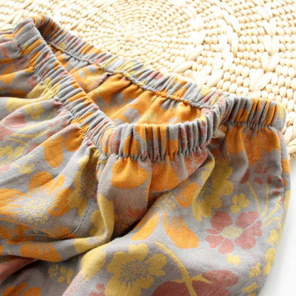 Gelbes Loungewear-Set aus Baumwolle mit Gänseblümchen-Revers