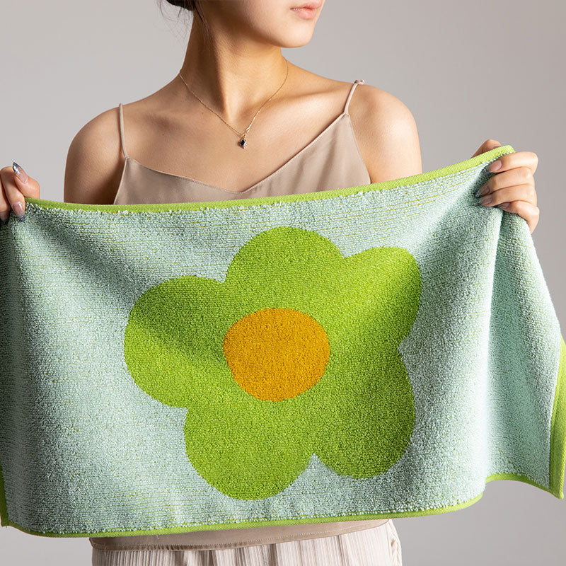 Atmungsaktives Baumwollhandtuch mit Blumenmuster und Farbblockdesign