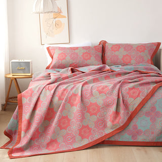 Wendbare Steppdecke aus Baumwollgaze mit Patchwork-Blumenmuster