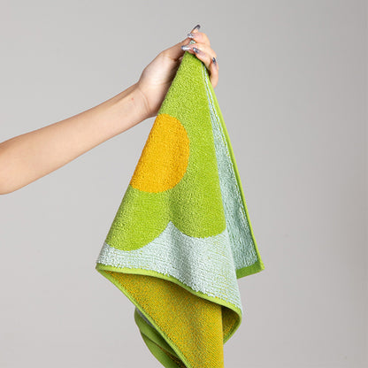 Atmungsaktives Baumwollhandtuch mit Blumenmuster und Farbblockdesign